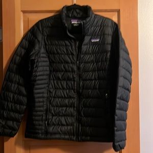 Women’s Patagonia black down jacket.